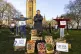 Riverford founder Guy Singh-Watson in front of 49 scarecrows
