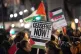 People during a pro-Palestine protest in Whitehall, central 