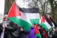 People take part in a Palestine Solidarity Campaign rally ou
