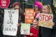 Climate campaigners from Extinction Rebellion Scotland prote