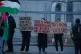 Protesters form a blockade outside weapons manufacturer BAE 