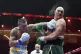 kapow: Oleksandr Usyk (left) lands a punch on Tyson Fury dur