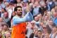 Manchester City's Ilkay Gundogan warms up as a substitute du