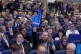 A Tom Tugendhat supporter holds up a giant foam finger ahead