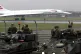 British troops at Heathrow Airport, as Concorde departs for 