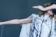 PJ Harvey performing on the Pyramid stage, at the Glastonbur