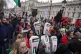 People take part in a silent procession and vigil by healthc