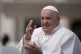 Pope Francis waves as he leaves after his weekly general aud