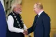 Russian President Vladimir Putin (right) awards Indian Prime