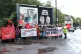 Unite members in front of a billboard promoting the campaign