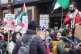 People demonstrate outside the constituency office of Labour