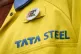 A steel worker wearing a badge on his jacket outside the UK'