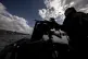 A Royal Marine patrols the waters at HMNB Clyde, which is th