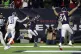 Houston Texans quarterback Deshaun Watson (4) scores on a 15
