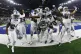 Dallas Cowboys players celebrate their win over the New Orle