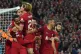 Liverpool's Joel Matip, left, celebrates with his teammates 