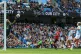 Manchester City's Ellie Roebuck (left) saves a shot from Man