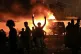 Protesters burning police vehicles in Baghdad