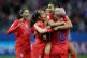 United States' Alex Morgan, second right, celebrates after s