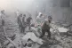 DEVASTATION: Palestinians evacuate wounded after an Israeli 