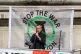 Jeremy Hardy reading the names of Iraq War victims at a Stop