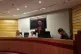 John Hendy QC speaks at Arise, flanked by (left to right) La