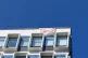 A banner hangs from the University of Brighton