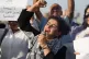A woman protests in Baghdad against amendments of Personal S