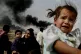 Iraqi families flee Basra in southern Iraq in 2003