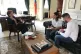 Ben Chacko (centre) and Steve Sweeney speak to Venezuelan am
