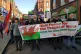John Haylett (second from left holding banner) has retired a