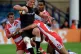 Newcastle Falcons' Chris Harris is tackled by Gloucesters' G