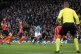 A penalty is awarded after Raheem Sterling (middle) kicks th