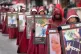 Campaigners from Woman, Life, Freedom, hold posters of women